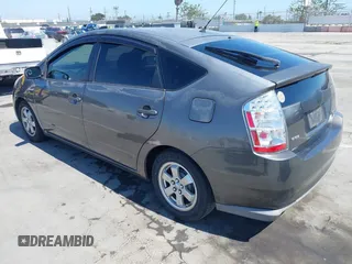 2007 Toyota Prius with VIN JTDKB20U073272767, listed as a IAAI auction lot 42520125 with 290,808 mi miles and . Bid and sale history available at DreamBid. Image 3.