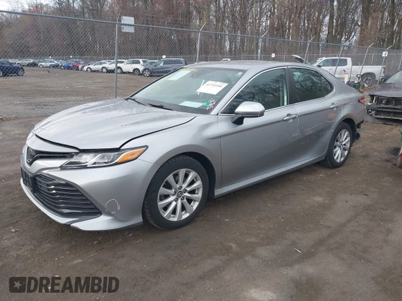 2019 Toyota Camry LE z VIN 4T1B11HK9KU851075, wystawiony jako IAAI lot #41911090 z przebiegiem 114 762 mil mil oraz . Historia ofert i sprzedaży dostępna na DreamBid. Obrazek 17.
