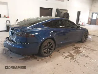 2021 Tesla Model S Plaid with VIN 5YJSA1E6XMF439884, listed as a IAAI auction lot 41622750 with Not provided miles and . Bid and sale history available at DreamBid. Image 4.