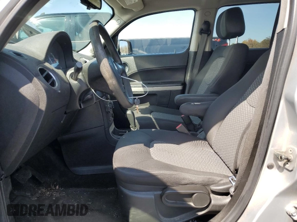 2010 Chevrolet HHR LS with VIN 3GNBAADB5AS588292, listed as a Copart auction lot 52305825 with 153,988 mi miles and Salvage Title. Bid and sale history available at DreamBid. Image 7.