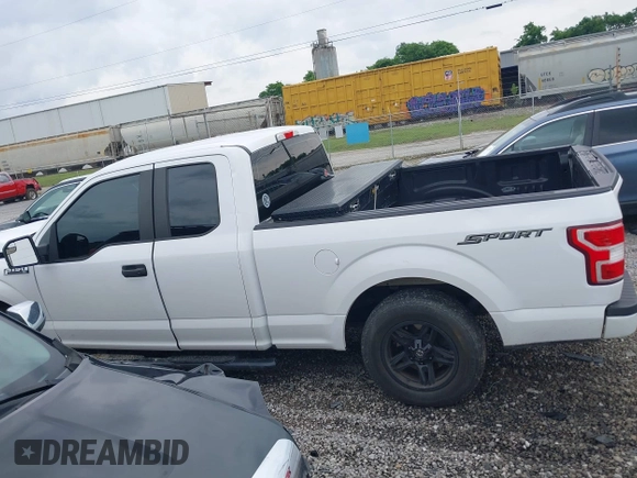 2020 Ford F-150 XL with VIN 1FTEX1CB2LKD36388, listed as a IAAI auction lot 42157444 with 227,864 mi miles and . Bid and sale history available at DreamBid. Image 14.