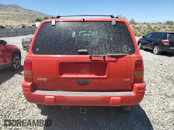 1997 Jeep Grand Cherokee Limited with VIN 1J4GZ78Y7VC573971, listed as a Copart auction lot 61358024 with 171,055 mi miles and Salvage Title. Bid and sale history available at carsss.com. Image 6.