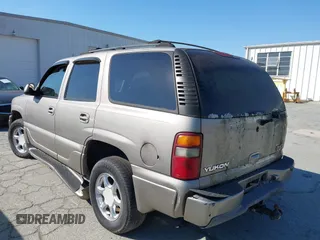 2002 GMC Yukon Denali z VIN 1GKEK63U82J341696, wystawiony jako IAAI lot #41772116 z przebiegiem 259 337 mil mil oraz . Historia ofert i sprzedaży dostępna na DreamBid. Obrazek 3.
