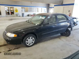 1998 Mazda 626 DX with VIN 1YVGF22C2W5751008, listed as a Copart auction lot 74742174 with 172,980 mi miles and Salvage Title. Bid and sale history available at carsss.com. Image 1.
