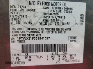2005 Ford F-350 XL with VIN 1FTWX31P35EB41027, listed as a Copart auction lot 57124585 with 304,957 mi miles and Salvage title. Bid and sale history available at DreamBid. Image 12.