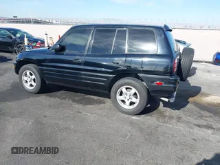 1999 Toyota RAV4 with VIN JT3GP10V9X7058125, listed as a IAAI auction lot 42056633 with 247,015 mi miles and . Bid and sale history available at DreamBid. Image 3.