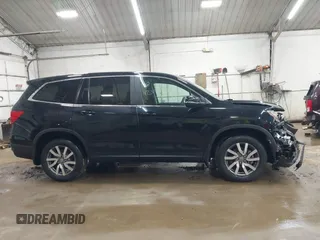 2020 Honda Pilot EX-L z VIN 5FNYF6H58LB061994, wystawiony jako IAAI lot #42358236 z przebiegiem 49 436 mil mil oraz . Historia ofert i sprzedaży dostępna na DreamBid. Obrazek 13.
