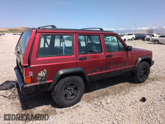 1996 Jeep Cherokee Sport with VIN 1J4FJ68S6TL171056, listed as a Copart auction lot 52099555 with 250,089 mi miles and Salvage Title. Bid and sale history available at carsss.com. Image 3.