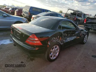1999 Mercedes-Benz SLK-Class with VIN WDBKK47F1XF124854, listed as a Copart auction lot 73160604 with 55,730 mi miles and Salvage Title. Bid and sale history available at carsss.com. Image 3.