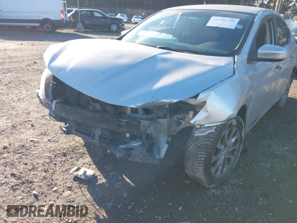 2018 Nissan Sentra S with VIN 3N1AB7AP0JY230120, listed as a IAAI auction lot 41236748 with 126,176 mi miles and . Bid and sale history available at DreamBid. Image 6.