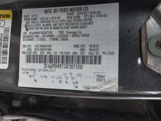 2016 Ford Fusion SE with VIN 3FA6P0H97GR307500, listed as a IAAI auction lot 41836573 with 126,404 mi miles and . Bid and sale history available at carsss.com. Image 9.