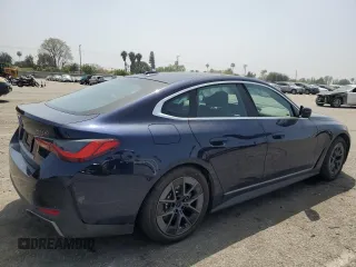 2023 BMW i4 eDrive40 with VIN WBY73AW09PFN76758, listed as a Copart auction lot 48096254 with 9,909 mi miles. Bid and sale history available at carsss.com. Image 3.