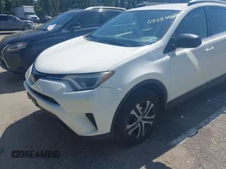 2017 Toyota RAV4 LE with VIN JTMBFREV4HJ112595, listed as a IAAI auction lot 42234289 with 207,379 mi miles and . Bid and sale history available at carsss.com. Image 6.