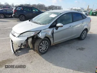 2015 Ford Fiesta SE z VIN 3FADP4BJ1FM220222, wystawiony jako IAAI lot #41209318 z przebiegiem 113 134 mil mil oraz . Historia ofert i sprzedaży dostępna na DreamBid. Obrazek 2.