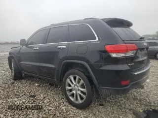2017 Jeep Grand Cherokee Limited with VIN 1C4RJFBG3HC948906, listed as a Copart auction lot 59345775 with 148,055 mi miles and Salvage title. Bid and sale history available at DreamBid. Image 2.