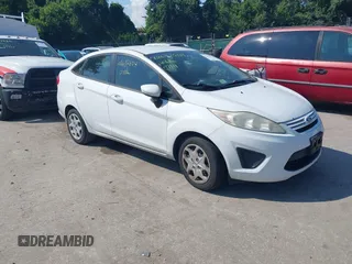 2013 Ford Fiesta S with VIN 3FADP4AJ7DM184180, listed as a IAAI auction lot 42632804 with 176,729 mi miles and . Bid and sale history available at DreamBid. Image 1.