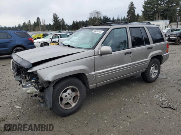 1997 Jeep Grand Cherokee Limited with VIN 1J4GZ78Y4VC693193, listed as a Copart auction lot 46327885 with 235,553 mi miles and Salvage Title. Bid and sale history available at carsss.com. Image 1.