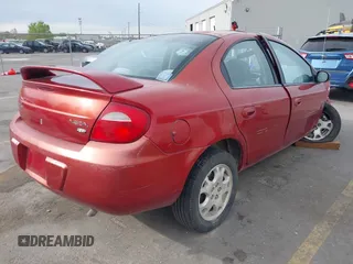 2004 Dodge Neon SXT with VIN 1B3ES56C04D504384, listed as a IAAI auction lot 41988581 with 166,602 mi miles. Bid and sale history available at carsss.com. Image 4.