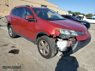 2015 Toyota RAV4 XLE with VIN JTMWFREV3FJ056079, listed as a Copart auction lot 82830964 with 208,357 mi miles and Salvage Title. Bid and sale history available at carsss.com. Image 4.