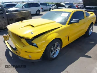 2006 Ford Mustang GT Deluxe with VIN 1ZVFT82H765126853, listed as a IAAI auction lot 36514152 with 160,888 mi miles. Bid and sale history available at carsss.com. Image 2.