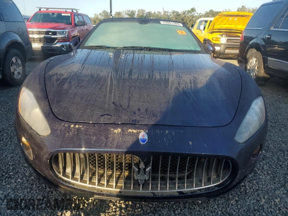 2015 Maserati GranTurismo Sport z VIN ZAM45MMA7F0127538, wystawiony jako Copart lot #75061384 z przebiegiem Nie podano mil oraz Nie do naprawy • Non repairable. Historia ofert i sprzedaży dostępna na DreamBid. Obrazek 5.