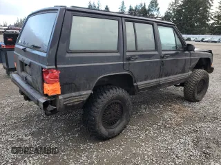 1988 Jeep Grand Cherokee z VIN 1JCMT7895JT247338, wystawiony jako Copart lot #83615234 z przebiegiem 185 676 mil mil oraz Szkoda całkowita • Salvage title. Historia ofert i sprzedaży dostępna na DreamBid. Obrazek 3.