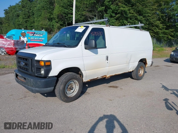 2011 Ford Econoline Cargo Commercial with VIN 1FTNE2EW2BDA58039, listed as a IAAI auction lot 42790590 with 240,510 mi miles and . Bid and sale history available at DreamBid. Image 2.