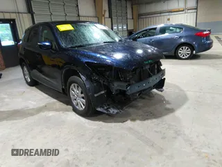 2016 Mazda CX-5 Sport with VIN JM3KE2BY5G0782385, listed as a IAAI auction lot 41971163 with 87,251 mi miles. Bid and sale history available at carsss.com. Image 1.