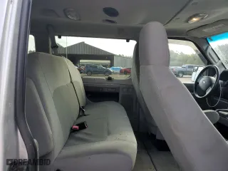 2012 Ford Econoline Wagon XL with VIN 1FBNE3BL0CDA29810, listed as a Copart auction lot 79014034 with 180,514 mi miles and Salvage Title. Bid and sale history available at carsss.com. Image 11.