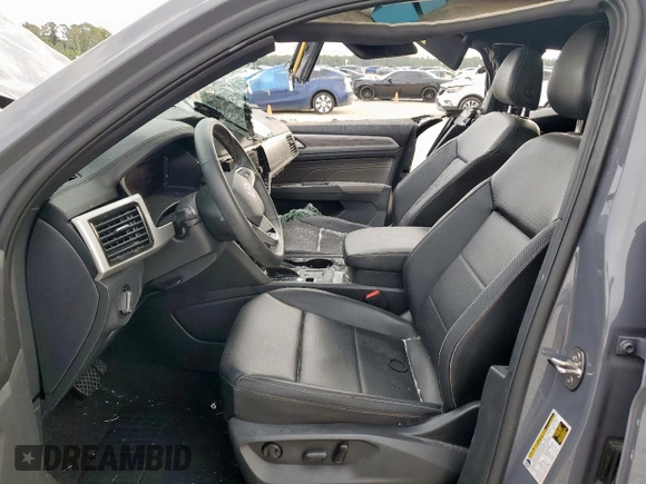 2022 Volkswagen Atlas SE with VIN 1V2JE2CA5NC222009, listed as a Copart auction lot 58000185 with 64,173 mi miles and Salvage title. Bid and sale history available at DreamBid. Image 7.