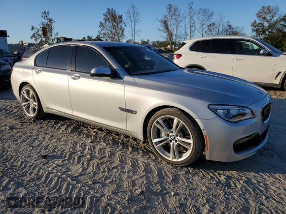 2015 BMW 7 Series 750i with VIN WBAYA8C53FGK19778, listed as a Copart auction lot 77258684 with 34,535 mi miles and Salvage title. Bid and sale history available at DreamBid. Image 4.