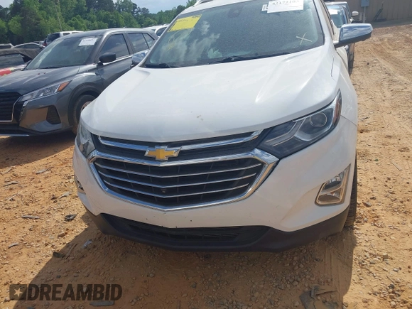2019 Chevrolet Equinox Premier z VIN 2GNAXPEX9K6177386, wystawiony jako IAAI lot #42172103 z przebiegiem 61 045 mil mil oraz . Historia ofert i sprzedaży dostępna na DreamBid. Obrazek 12.