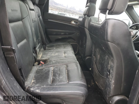 2014 Jeep Grand Cherokee Summit с VIN 1C4RJFJG4EC427075, выставлен на аукционе Copart как лот 49504095 с пробегом 147 342 миль миль и Списание • Salvage title. История ставок и продаж доступна на DreamBid. Изображение 11.