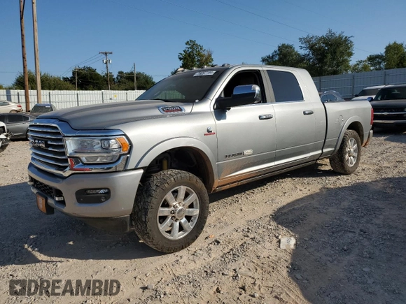 2021 Ram 2500 Longhorn with VIN 3C6UR5PLXMG576496, listed as a Copart auction lot 76097194 with 115,712 mi miles and Salvage title. Bid and sale history available at DreamBid. Image 1.
