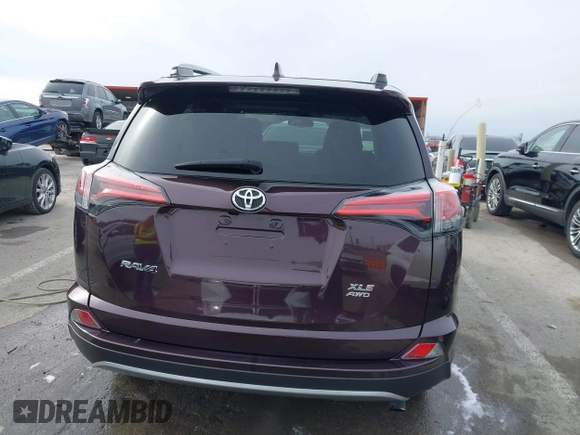 2018 Toyota RAV4 XLE with VIN 2T3RFREV6JW857693, listed as a IAAI auction lot 41541902 with 62,415 mi miles. Bid and sale history available at carsss.com. Image 16.