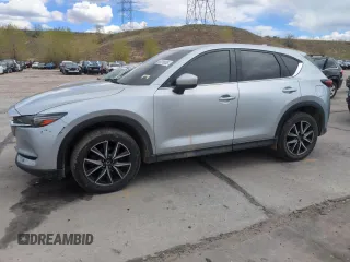 2018 Mazda CX-5 Grand Touring with VIN JM3KFBDM5J0422290, listed as a Copart auction lot 55391035 with 75,297 mi miles and Salvage title. Bid and sale history available at DreamBid. Image 1.