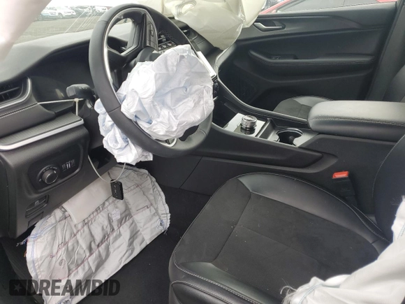 2024 Jeep Grand Cherokee Altitude X with VIN 1C4RJHAG4RC247791, listed as a Copart auction lot 58950805 with 10,467 mi miles and Salvage title. Bid and sale history available at DreamBid. Image 7.