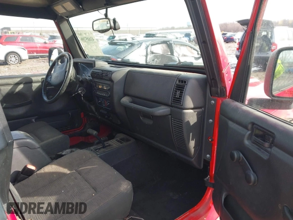 2003 Jeep Wrangler Sport with VIN 1J4FA49S53P305096, listed as a IAAI auction lot 41685209 with 165,247 mi miles. Bid and sale history available at carsss.com. Image 5.