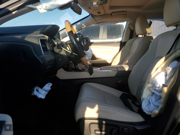 2021 Lexus RX 350L with VIN JTJHZKEA1M2021324, listed as a Copart auction lot 79802474 with 84,221 mi miles and Salvage title. Bid and sale history available at DreamBid. Image 7.