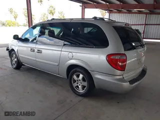 2005 Dodge Caravan SXT with VIN 2D4GP44L85R477720, listed as a IAAI auction lot 41925419 with 202,972 mi miles. Bid and sale history available at carsss.com. Image 3.