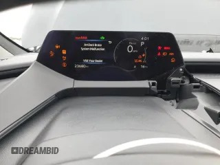 2023 Toyota Prius LE z VIN JTDACAAU4P3007061, wystawiony jako Copart lot #48859845 z przebiegiem 23 680 mil mil oraz Szkoda całkowita • Salvage title. Historia ofert i sprzedaży dostępna na DreamBid. Obrazek 9.