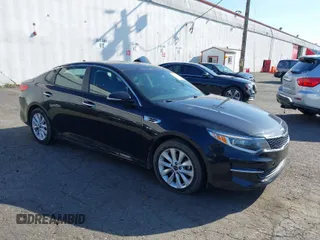2016 Kia Optima LX with VIN 5XXGT4L31GG003274, listed as a IAAI auction lot 42033788 with 1 mi miles. Bid and sale history available at carsss.com. Image 1.