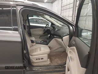 2015 Ford Escape Titanium with VIN 1FMCU9J96FUA43337, listed as a IAAI auction lot 41825328 with 149,639 mi miles and . Bid and sale history available at DreamBid. Image 5.