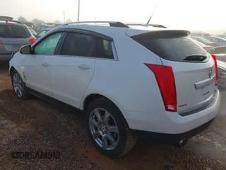 2011 Cadillac SRX Performance Collection with VIN 3GYFNBEY4BS600709, listed as a IAAI auction lot 40858453 with 148,769 mi miles. Bid and sale history available at carsss.com. Image 3.