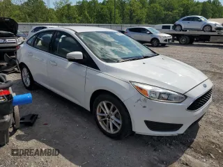 2016 Ford Focus SE с VIN 1FADP3F29GL323601, выставлен на аукционе Copart как лот 56407185 с пробегом 57 000 миль миль и Списание • Salvage title. История ставок и продаж доступна на DreamBid. Изображение 4.