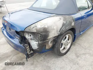 1999 Mazda MX-5 Miata with VIN JM1NB3531X0136037, listed as a IAAI auction lot 42196338 with Not provided miles and . Bid and sale history available at DreamBid. Image 6.