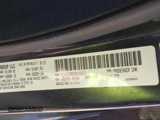 2014 Dodge Avenger SE with VIN 1C3CDZAB1EN133550, listed as a IAAI auction lot 42033001 with 137,592 mi miles. Bid and sale history available at carsss.com. Image 9.
