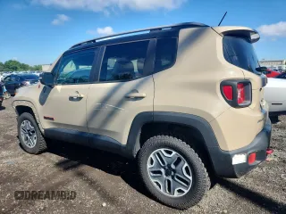 2015 Jeep Renegade Trailhawk with VIN ZACCJBCT0FPB59921, listed as a Copart auction lot 64270935 with 84,906 mi miles and Salvage title. Bid and sale history available at DreamBid. Image 2.