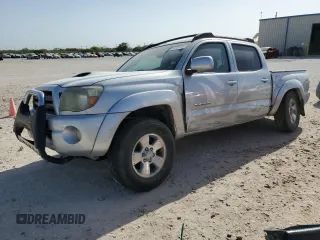 2009 Toyota Tacoma PreRunner z VIN 3TMJU62N69M079303, wystawiony jako Copart lot #49885905 z przebiegiem 299 958 mil mil oraz Szkoda całkowita • Salvage title. Historia ofert i sprzedaży dostępna na DreamBid. Obrazek 1.