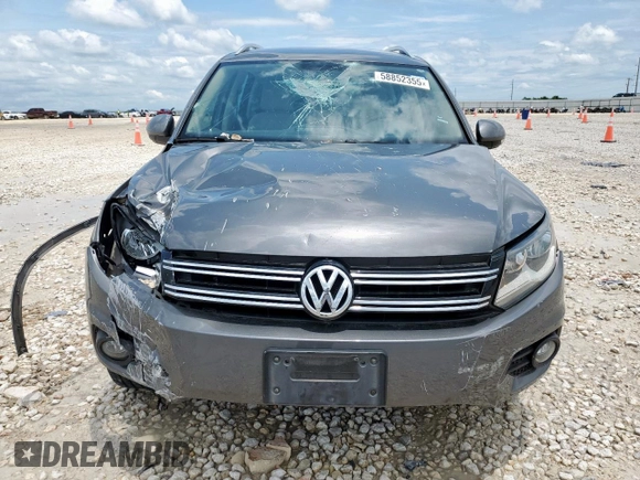 2014 Volkswagen Tiguan SEL с VIN WVGAV3AX7EW506170, выставлен на аукционе Copart как лот 58852355 с пробегом 55 961 миль миль и Списание • Salvage title. История ставок и продаж доступна на DreamBid. Изображение 5.